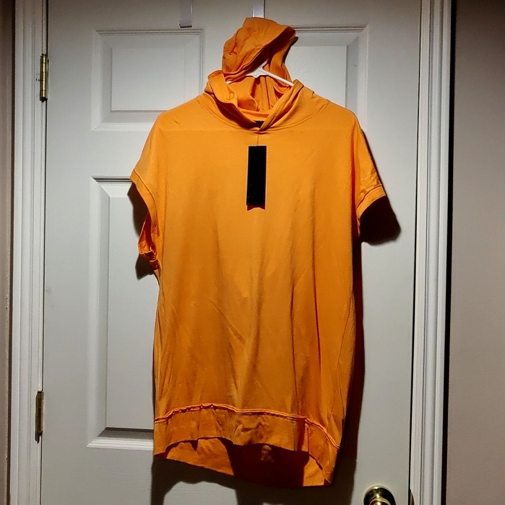 Mono B muscle short sleeve hoodie with open back in neon orange.